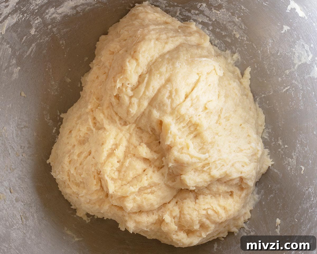 Dough mixed in a bowl.