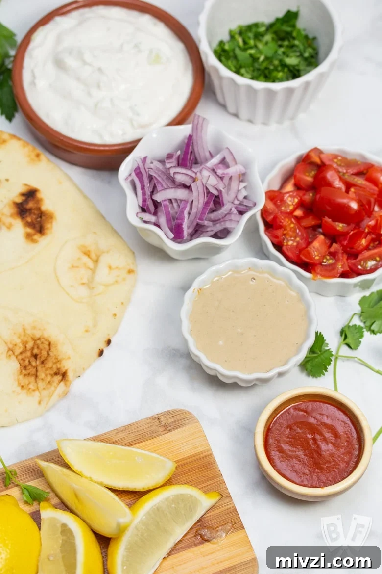 Classic Hummus from Canned Chickpeas – Quick Authentic Recipe 8 Overhead view of the ingredients for Falafel-Spiced Chickpea Flatbreads.