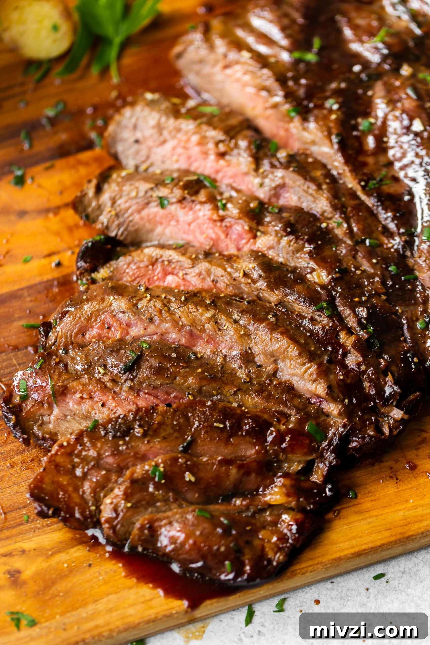 Grilled Flank Steak with Tangy Balsamic Marinade 2 thinly sliced flank steak that marinated in a balsamic marinade all day