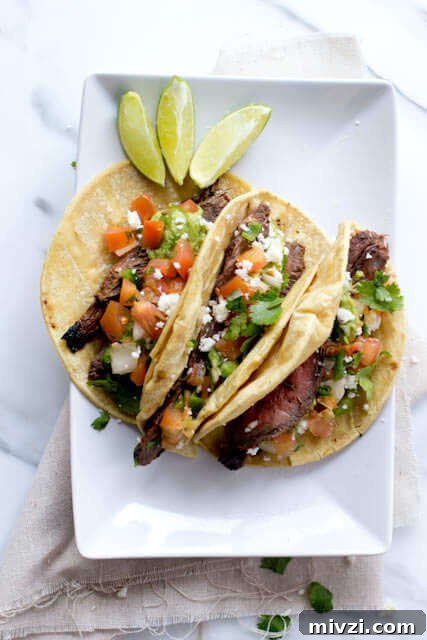 Grilled Flank Steak with Tangy Balsamic Marinade 4 marinated carne asada tacos ohsweetbasil.com