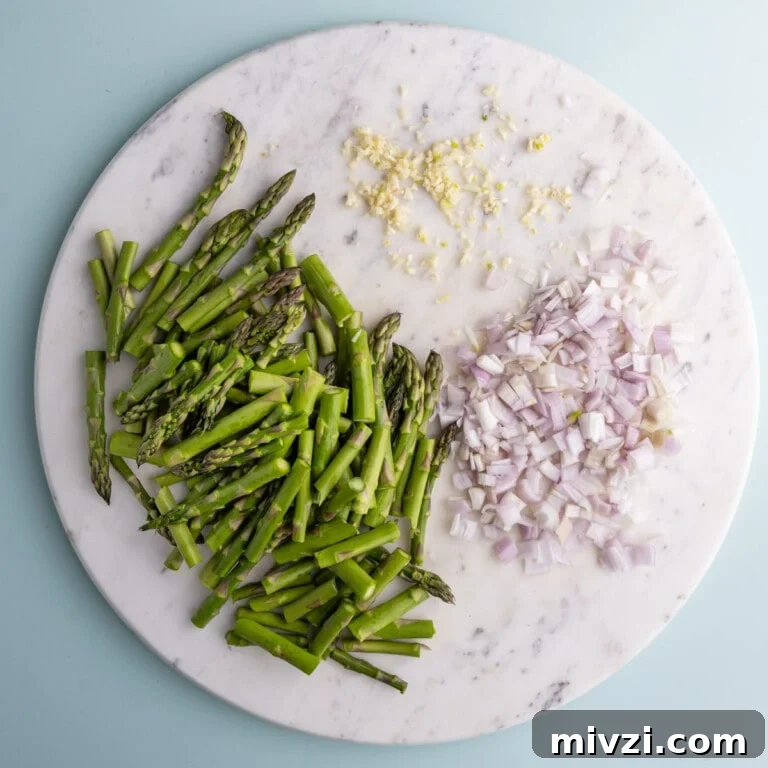 Cheesy Baked Asparagus Casserole Recipe with Crispy Top 19 Chopped asparagus, minced garlic, and diced shallots