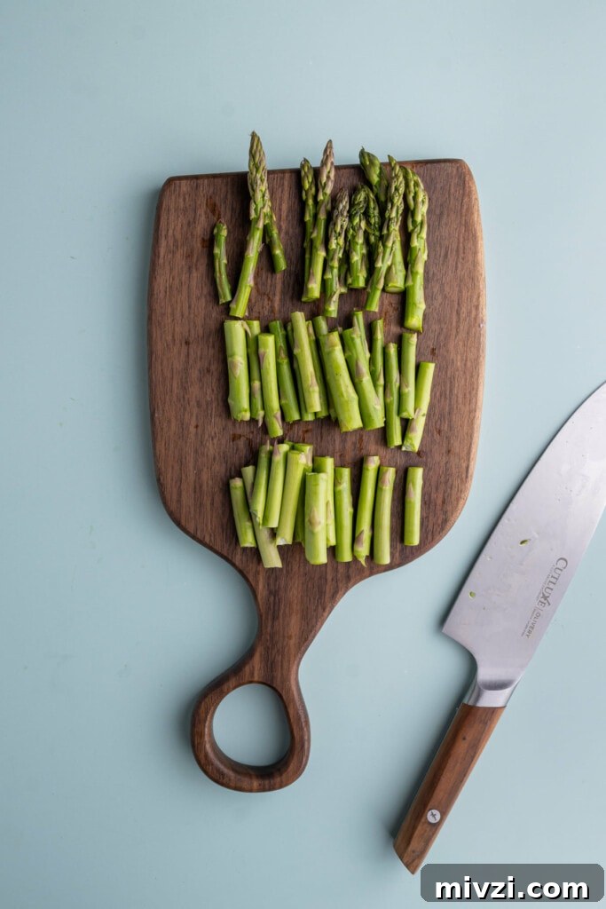 Cheesy Baked Asparagus Casserole Recipe with Crispy Top 6 Asparagus with woody ends cut off, then sliced into thirds.