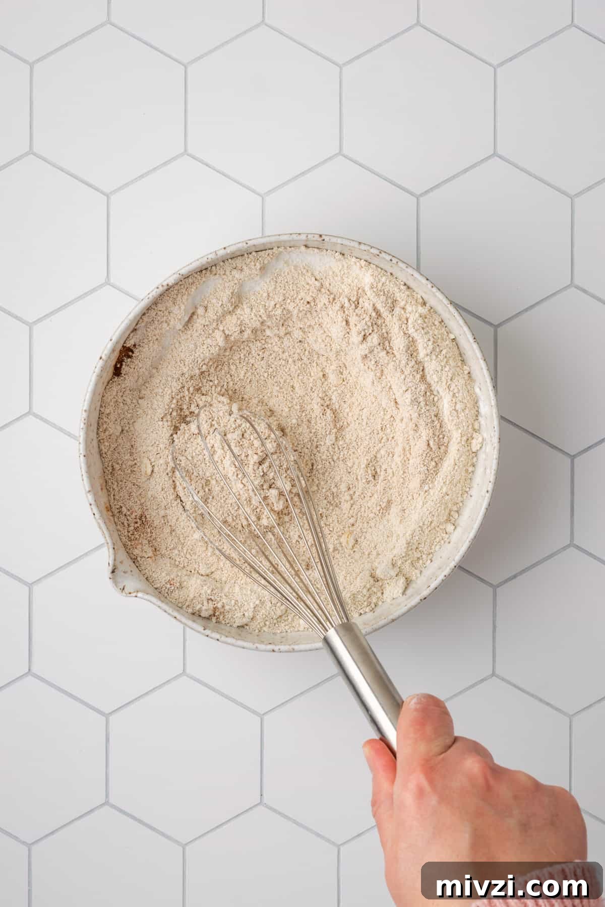 Oat flour in a large bowl.