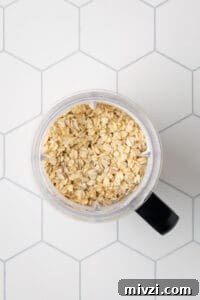 Gluten free oats in a blender jar.