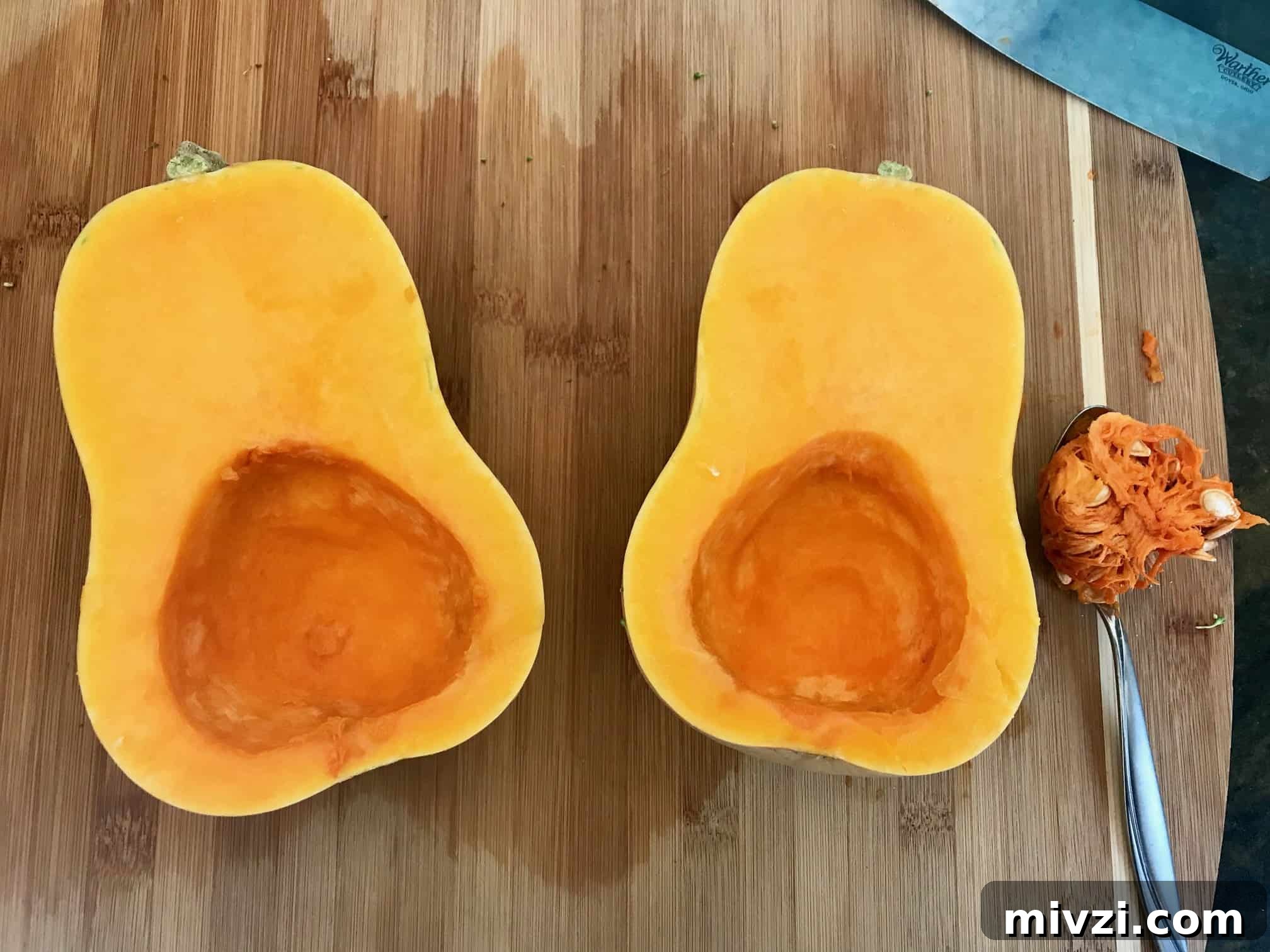 How to Cut a Butternut Squash Safely and Quickly 4 Butternut squash on cutting board cut in half with seeds removed