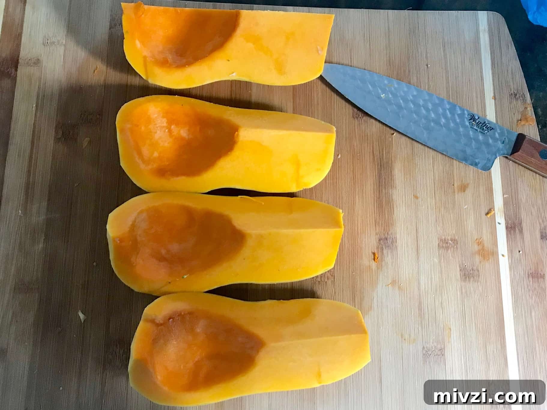 How to Cut a Butternut Squash Safely and Quickly 7 Butternut squash peeled and cut into fourths
