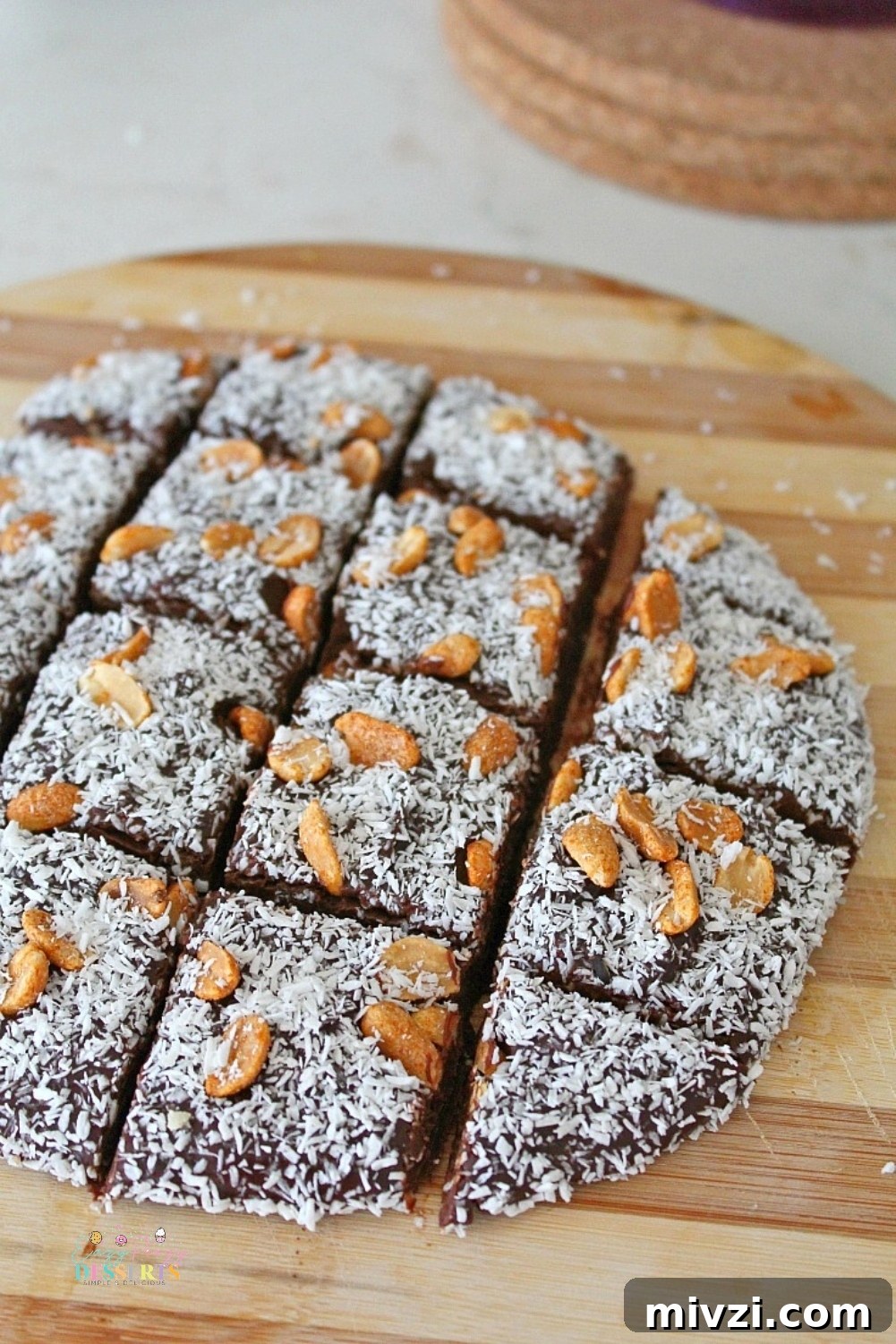 Microwave fudge decorated with coconut and peanuts
