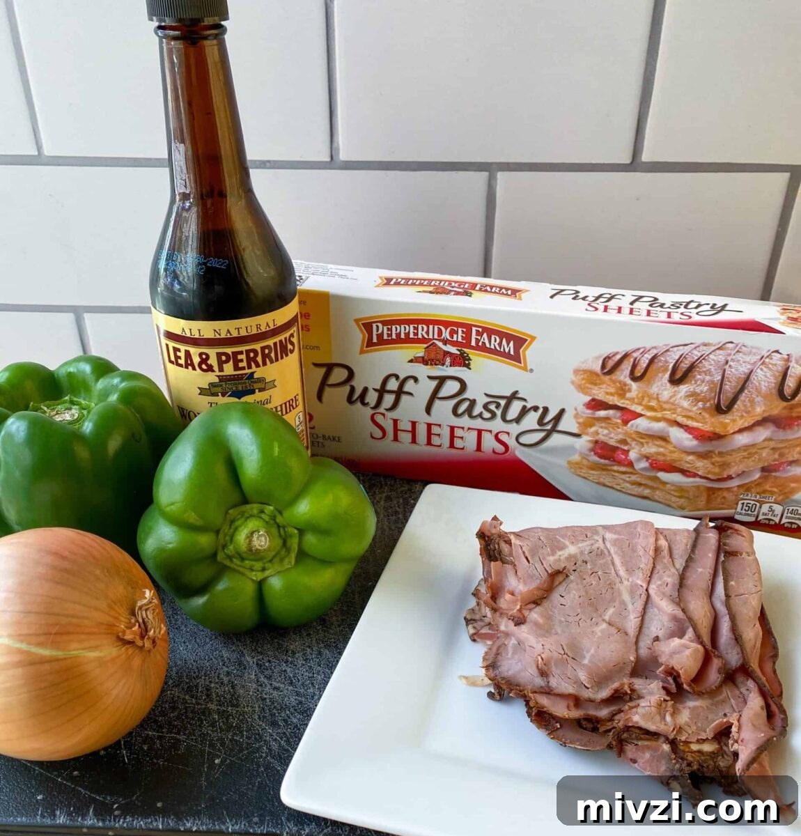 Mini Philly Cheesesteak Sliders: Bite-Sized Steak & Cheese Delight 3 Basic ingredients combine to create a mini version of an iconic sandwich.
