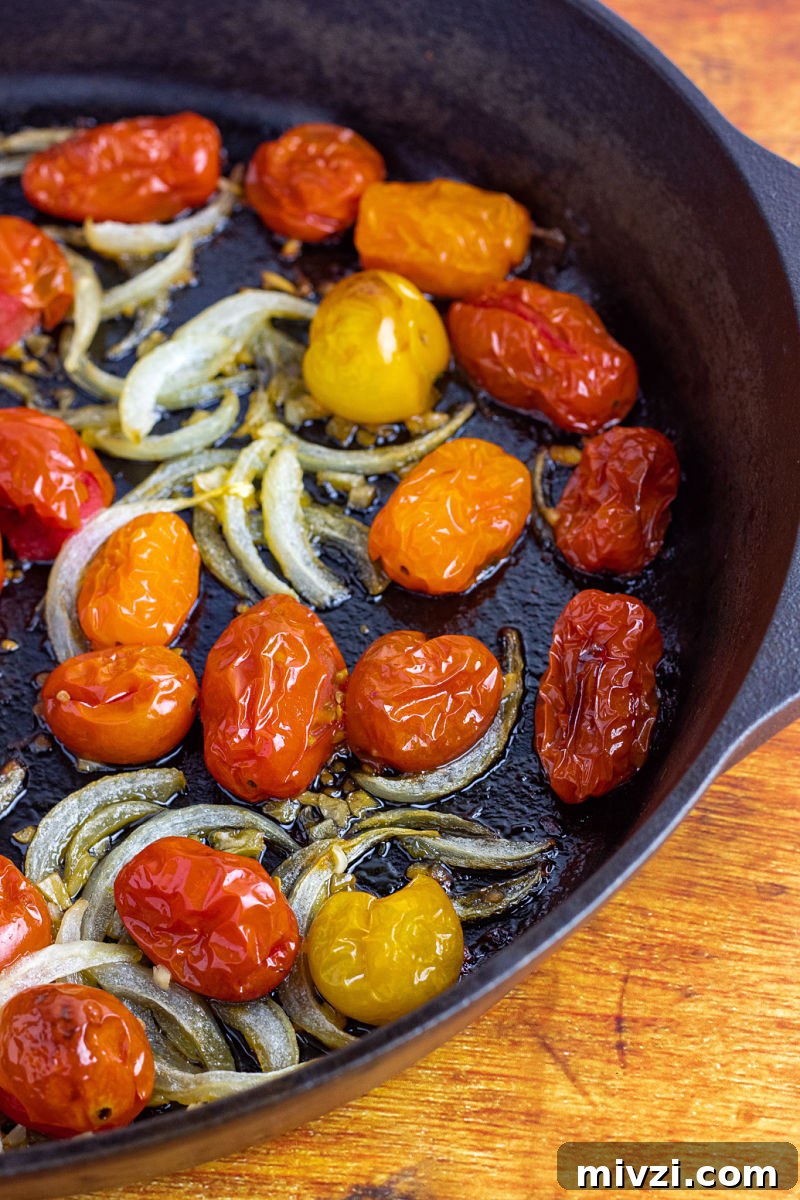 Oven-Roasted Cherry Tomatoes Recipe for Bursting Flavor 5 Oven Roasted Cherry Tomatoes in Cast Iron Skillet
