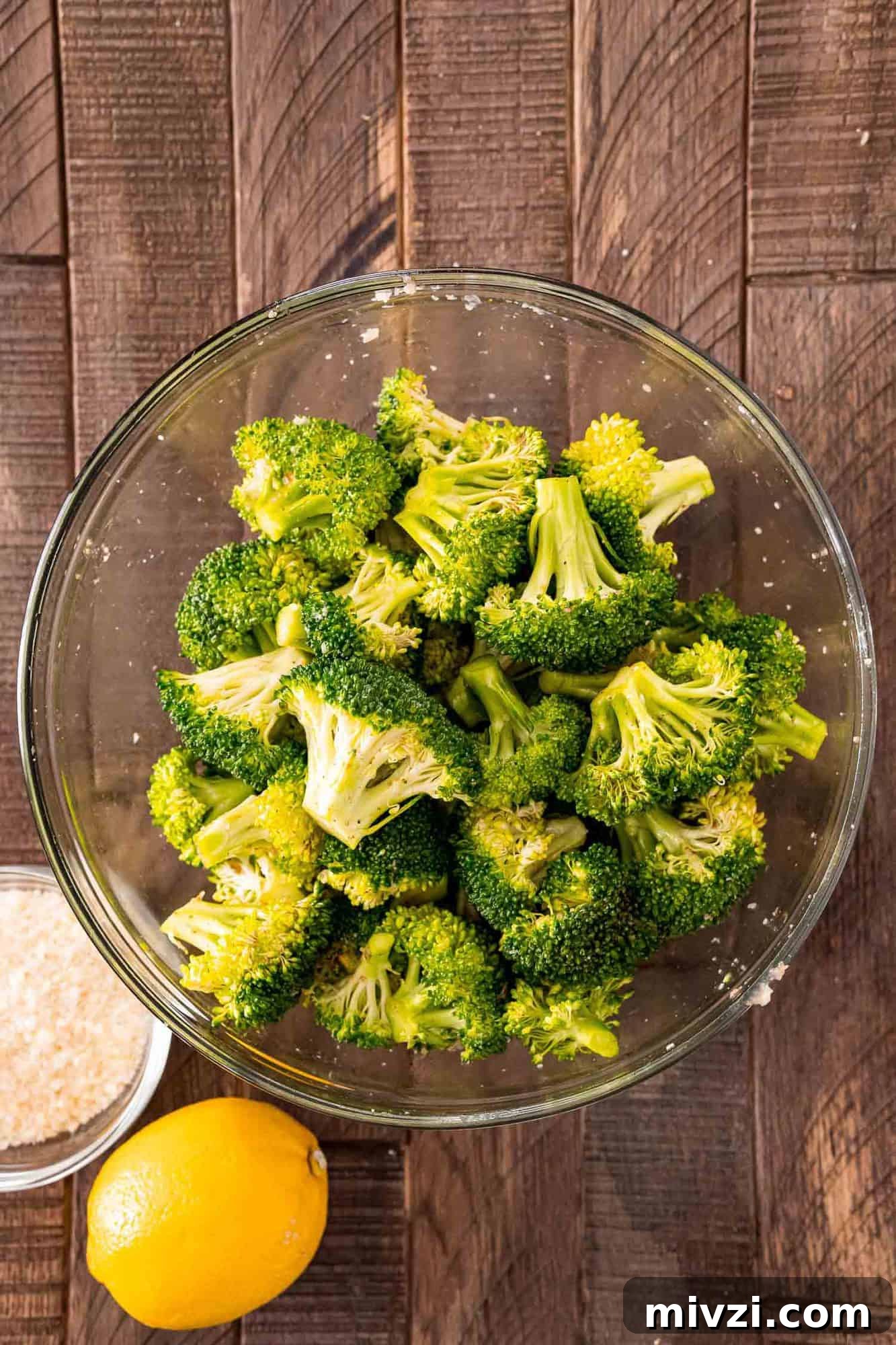 Broccoli in a bowl, white background.