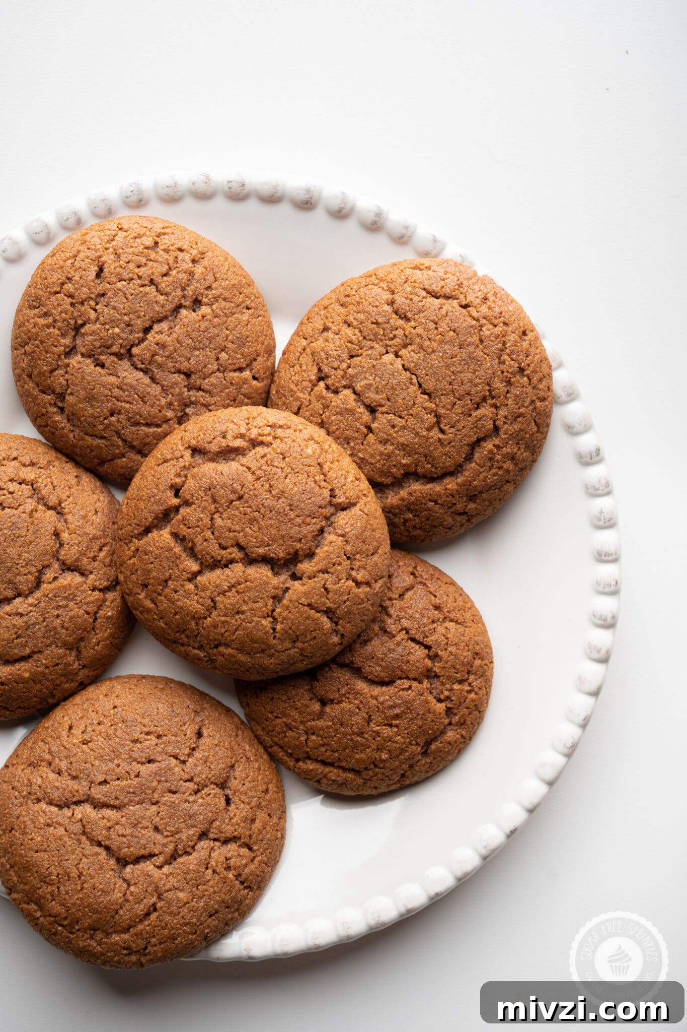 Soft Keto Gingerbread Cookies: Chewy Low-Carb Holiday Treat 9 A plate of finished gingerbread cookies.