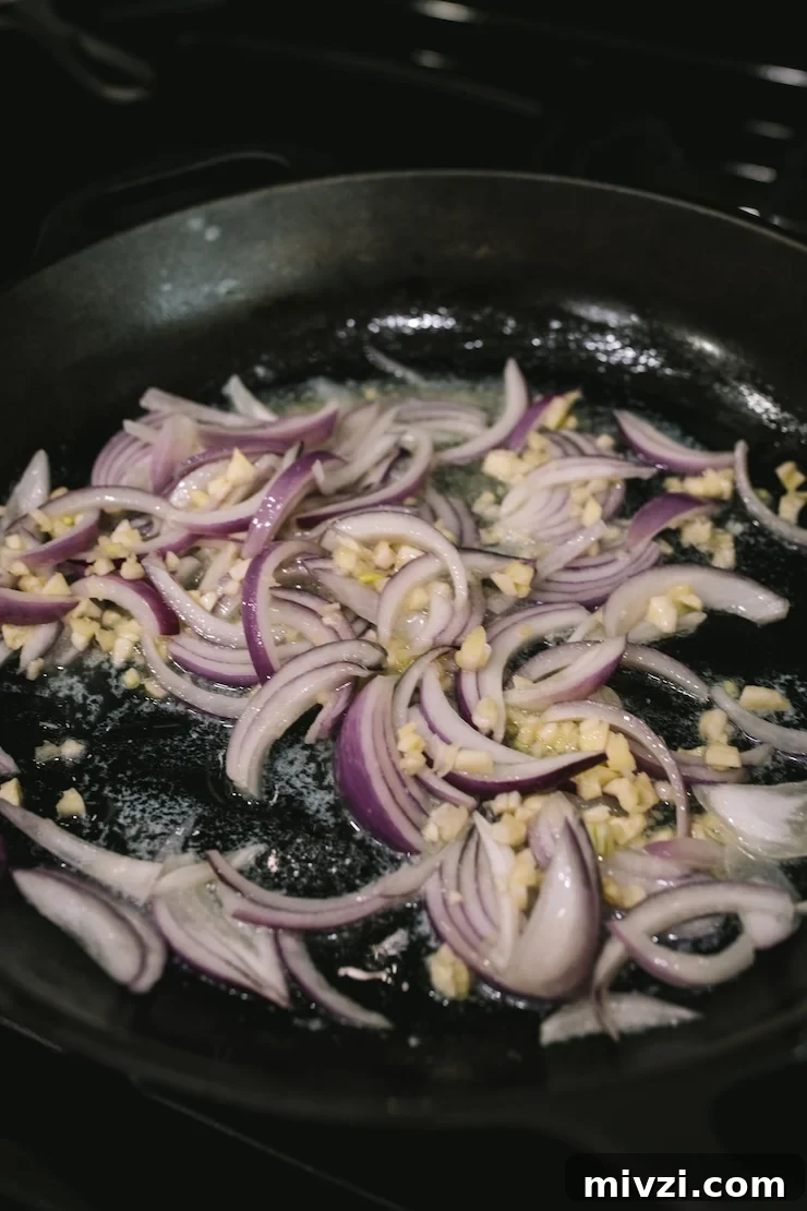 Garlic Shrimp Mexican-Style: Mojo de Ajo Camarones Recipe 6 saute garlic and onion in a cast iron skillet.