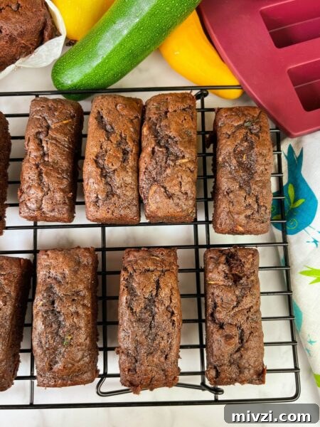 mini loaves of chocolate zucchini loaf on cooling rack