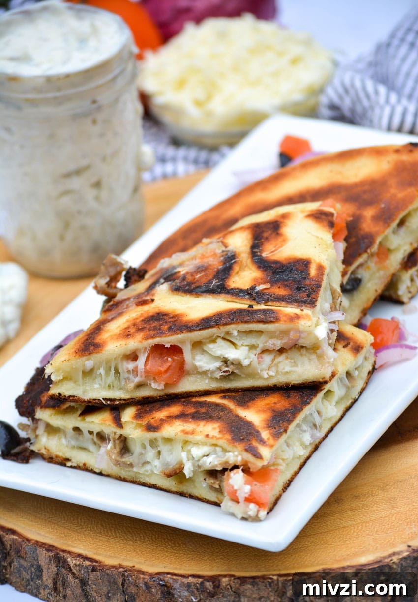greek gyro quesadillas on a white platter