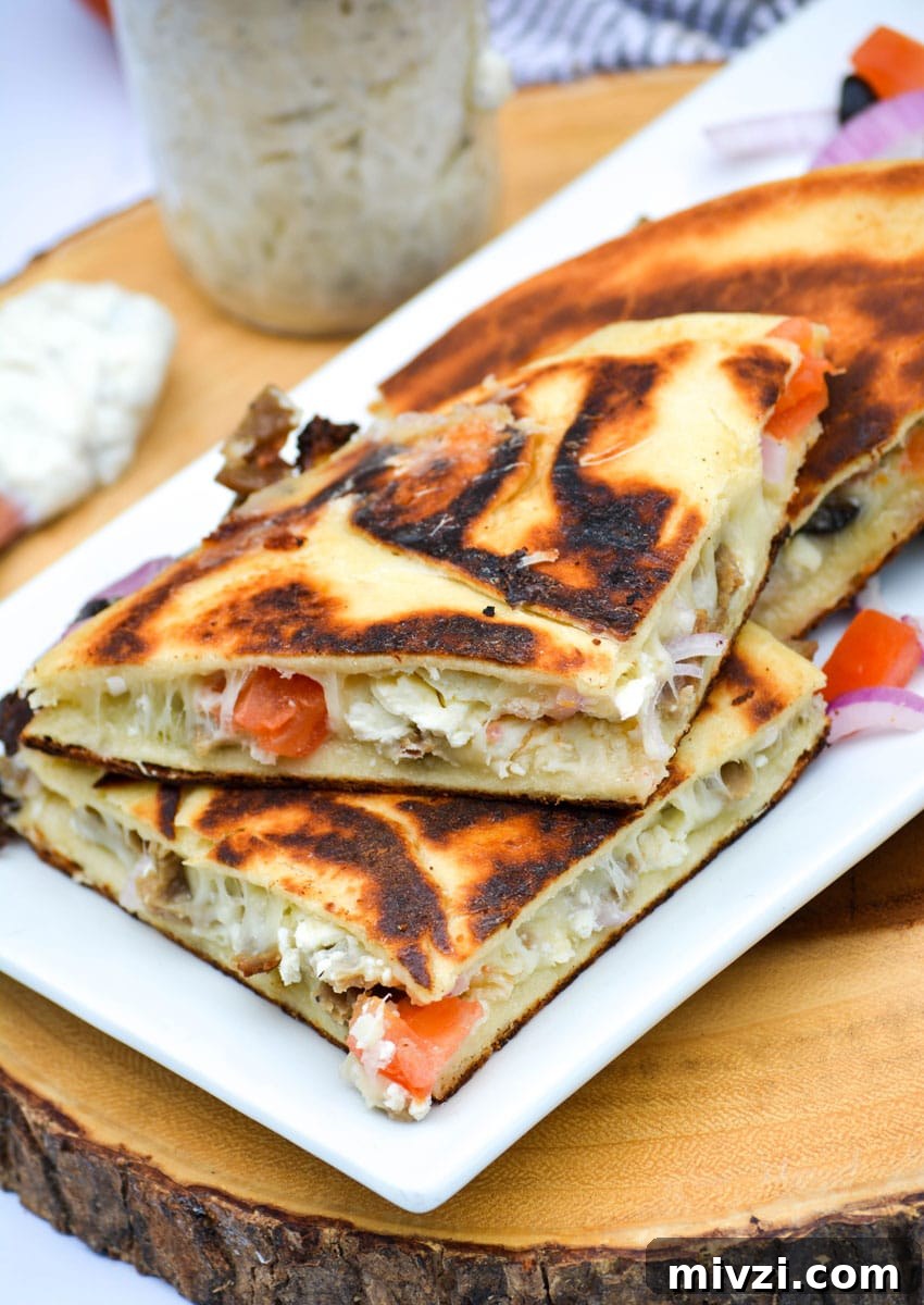 greek gyro quesadillas on a white platter