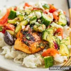 Mediterranean-Style Grilled Chicken with Lemon and Herbs 15 Mediterranean chicken served over rice and topped with cucumber salad.