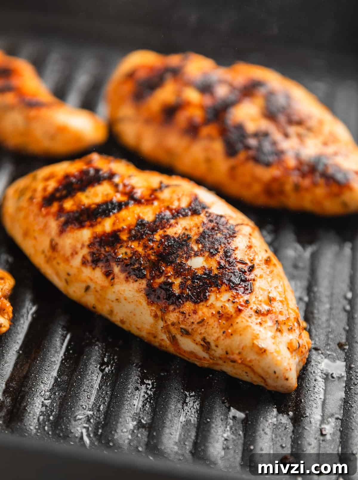 Mediterranean-Style Grilled Chicken with Lemon and Herbs 8 Grill pan with chicken breast.