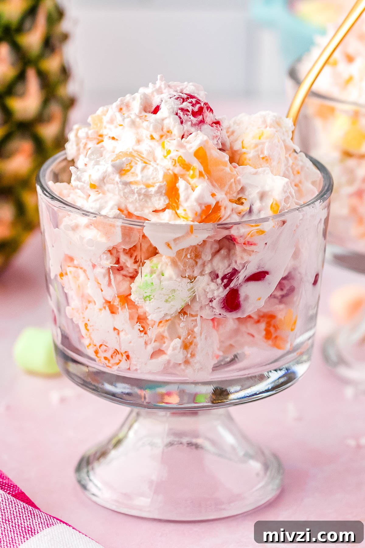 Ambrosia Salad with Cool Whip in individual serving dishes.
