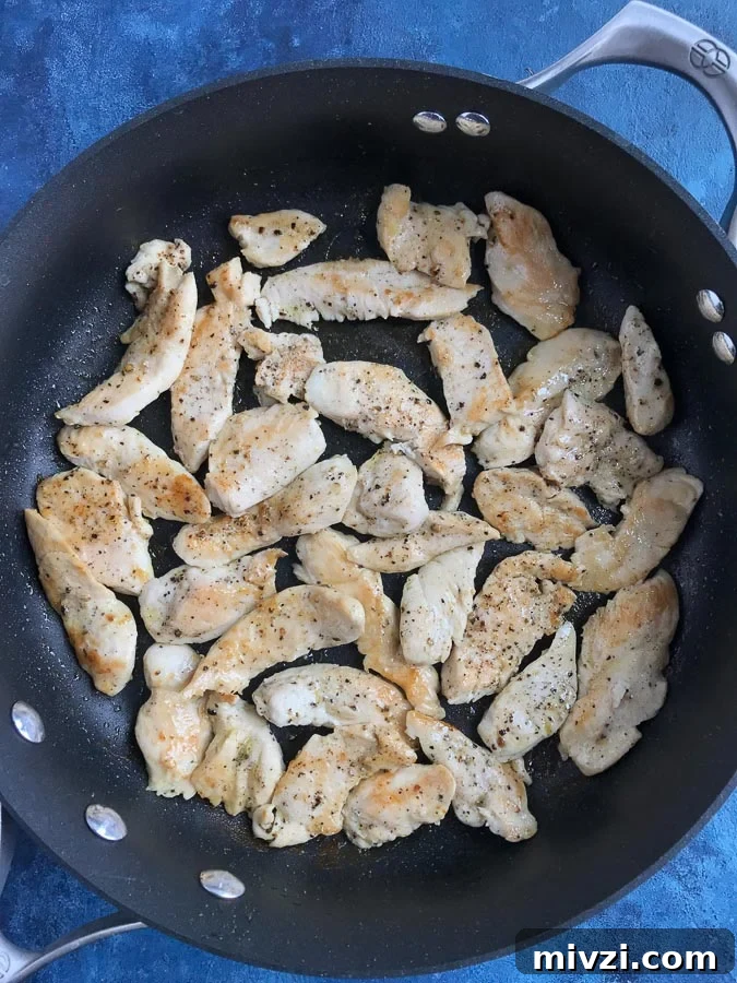 Creamy Chicken Alfredo Pasta Recipe: Quick Garlic Parmesan Dinner 2 pan seared chicken in a skillet