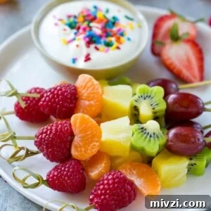 This recipe for fruit kabobs is a rainbow of fruit served on skewers with a yogurt dipping sauce.