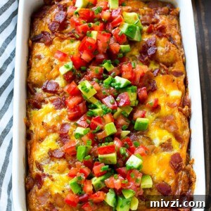 This breakfast casserole with bacon is a hearty meal that's full of eggs, cheese and potatoes. It's perfect for a holiday breakfast!