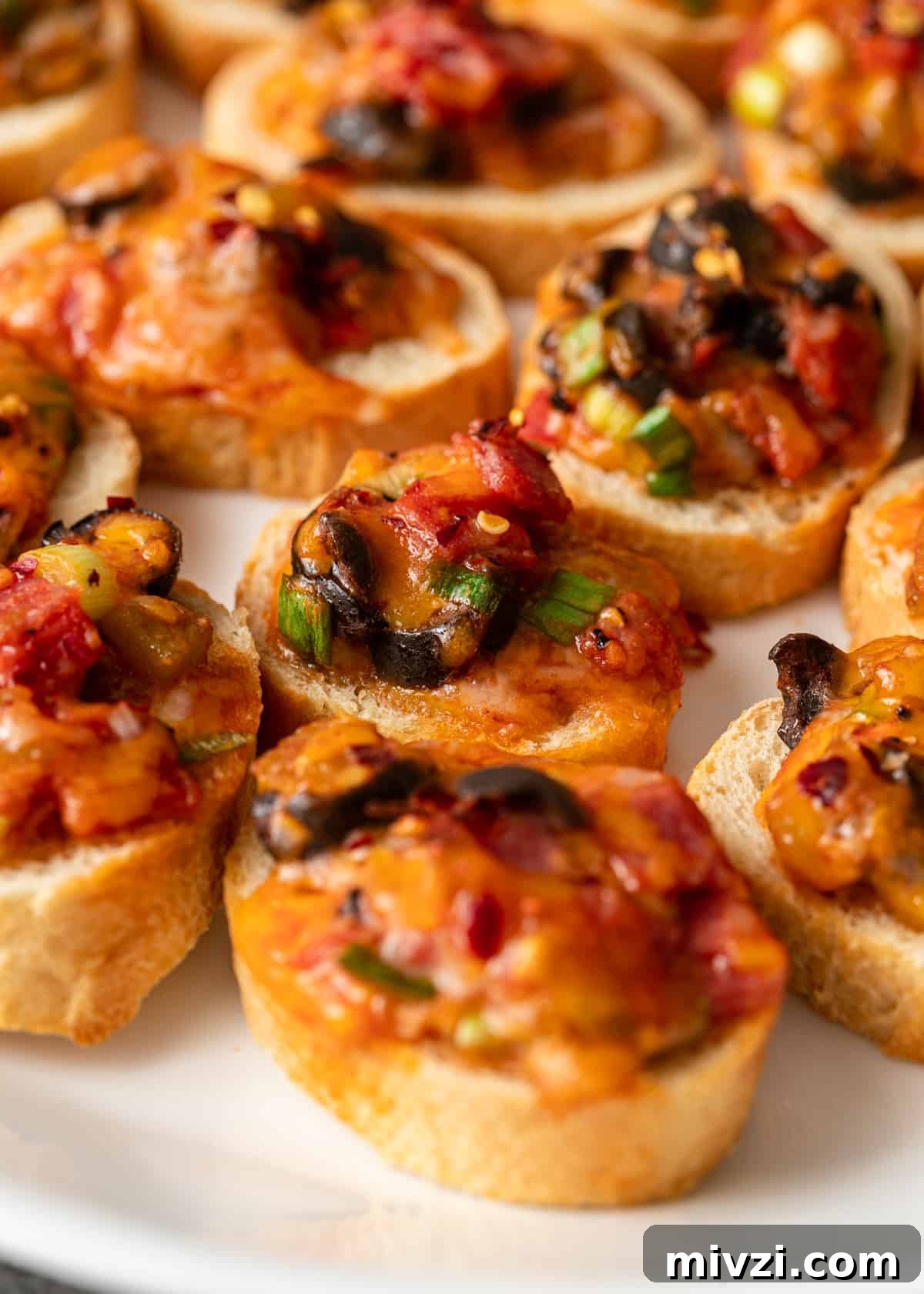Mini Pizza Bites: Quick Party Appetizers for Any Occasion 3 several mini pizza bites