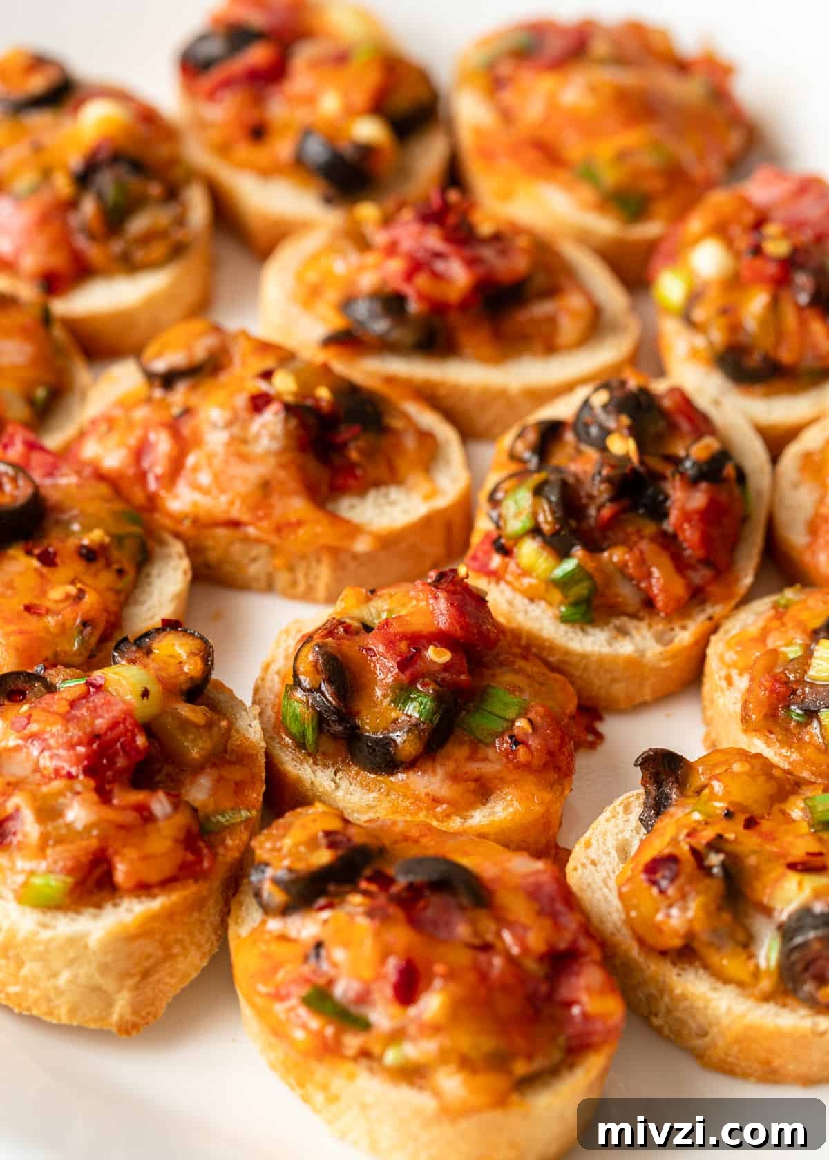 Mini Pizza Bites: Quick Party Appetizers for Any Occasion 7 platter filled with mini pizza bites