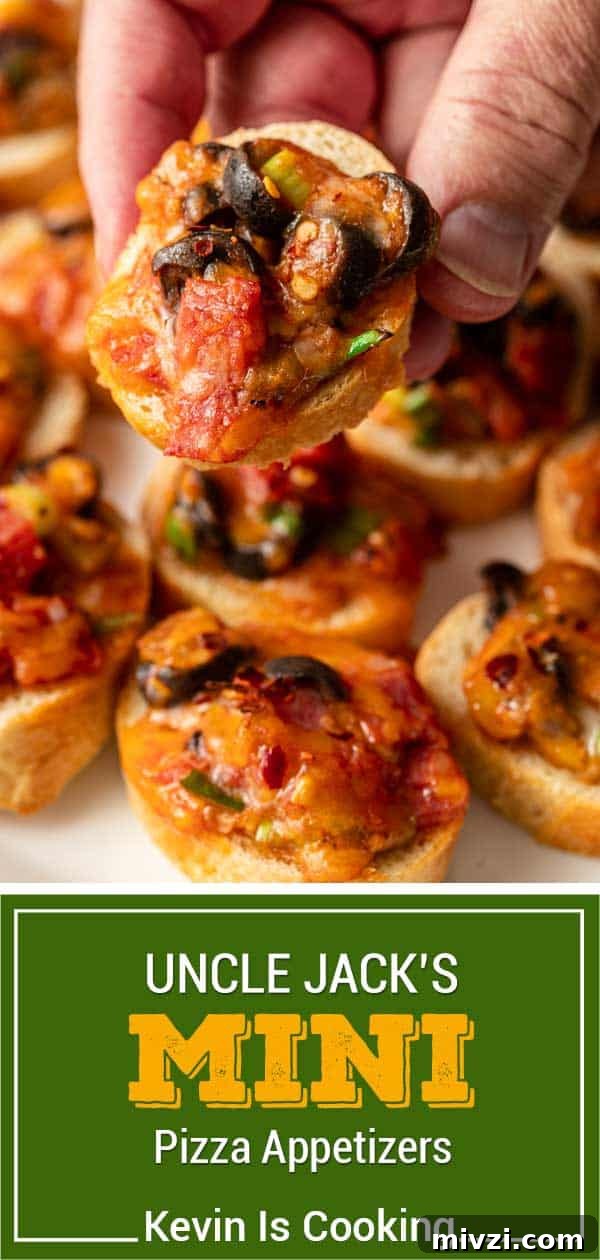 Mini Pizza Bites: Quick Party Appetizers for Any Occasion 10 hand holding a mini pizza bite