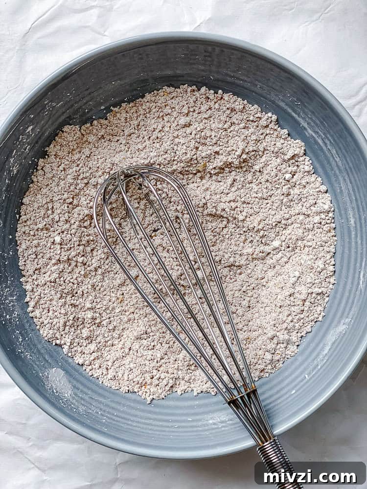process shot showing mixing ingredients in a bowl