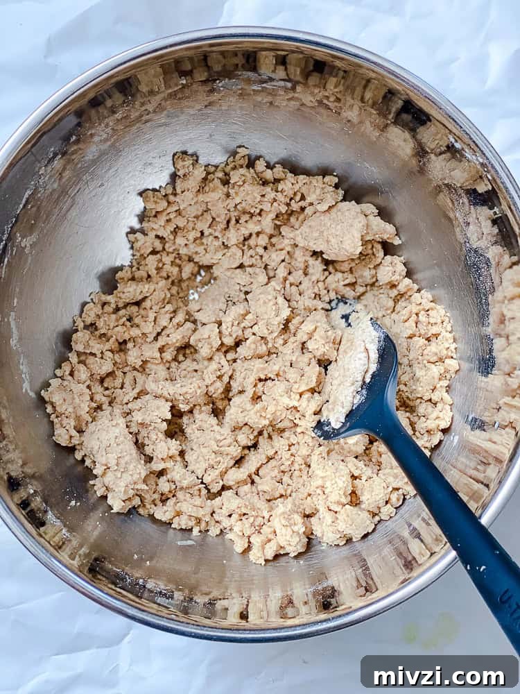 process shot showing mixing ingredients in a bowl