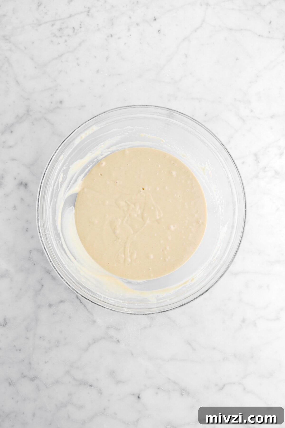cake batter in glass bowl.