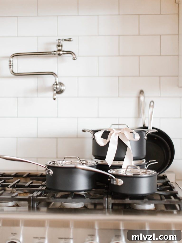 Crate & Barrel All Clad Cookware on stove