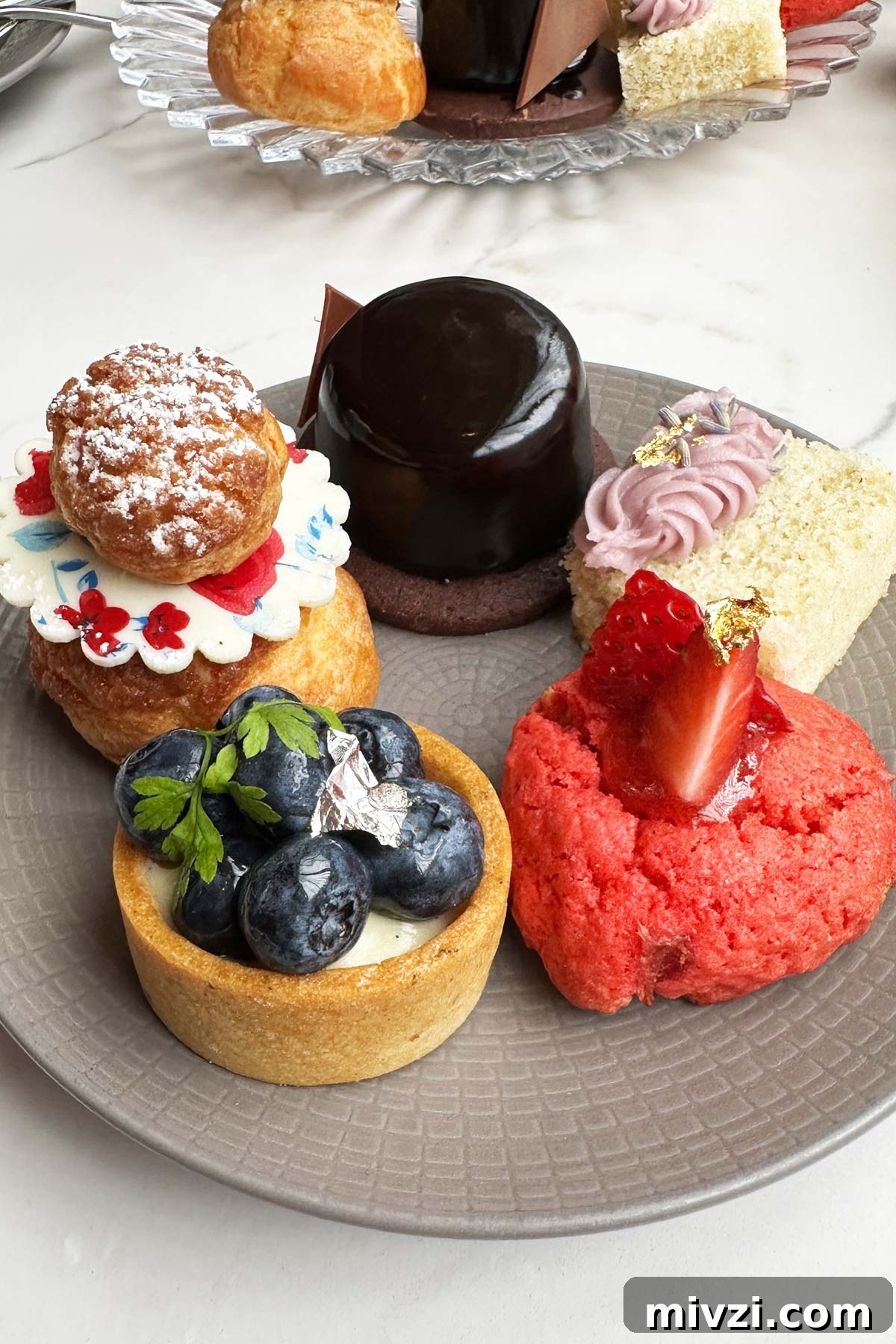Afternoon Tea at Baccarat Hotel New York: A Luxurious Review 9 Desserts at an afternoon tea.