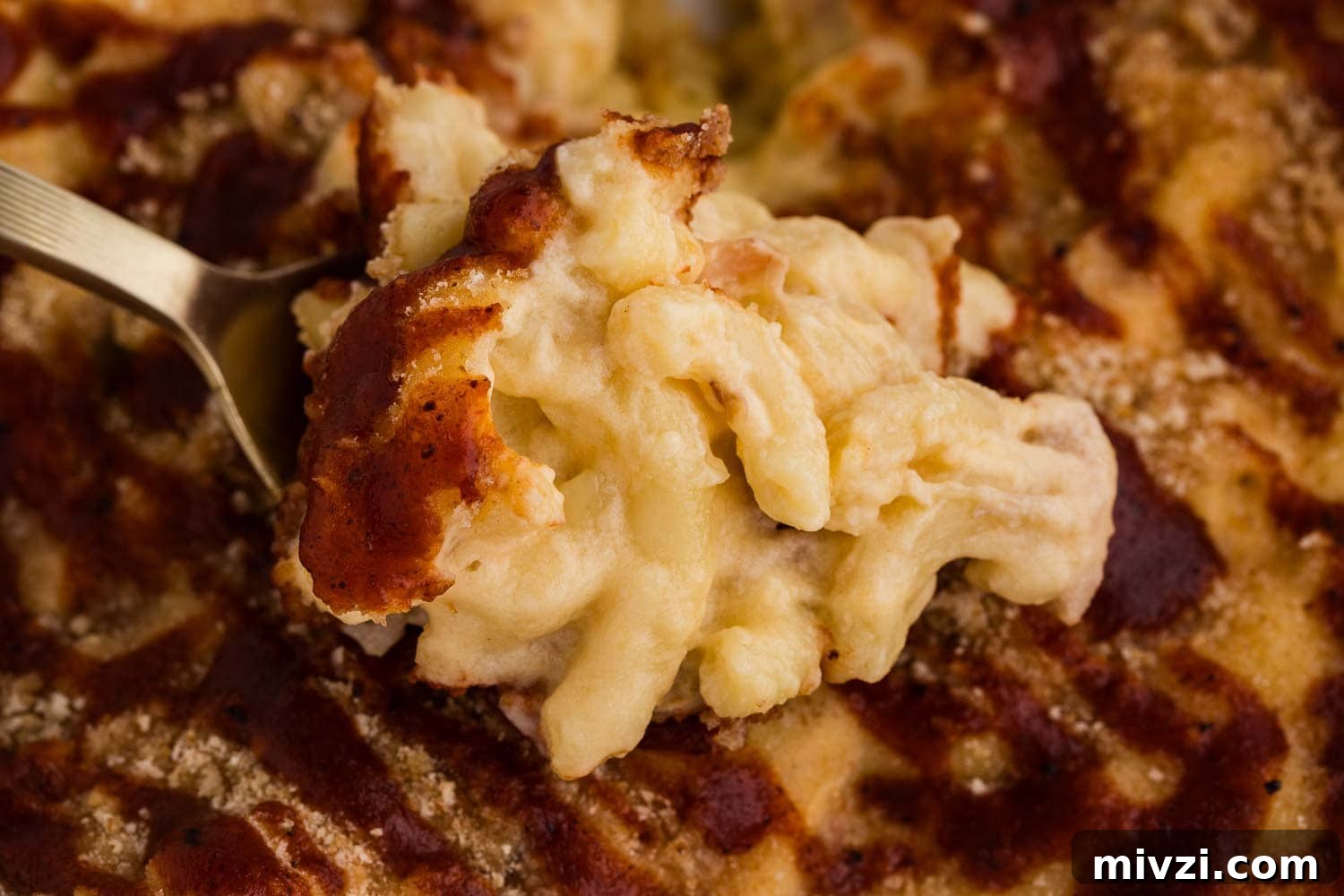 Pulled Pork Mac and Cheese Recipe — Slow-Cooked BBQ Comfort Dish 7 close up spoonful of pulled pork Mac and cheese