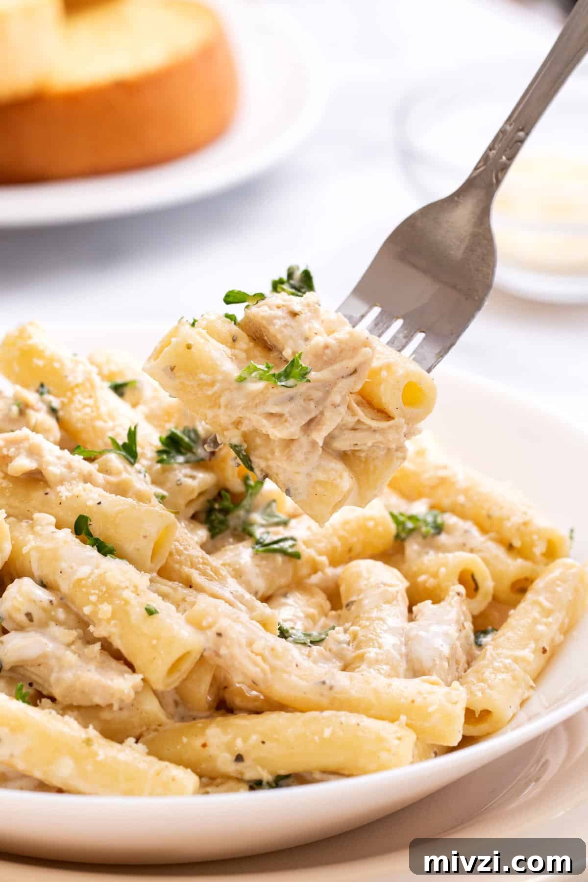 Plate of crockpot chicken alfredo.