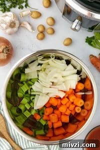 An Instant Pot filled with vegetables.