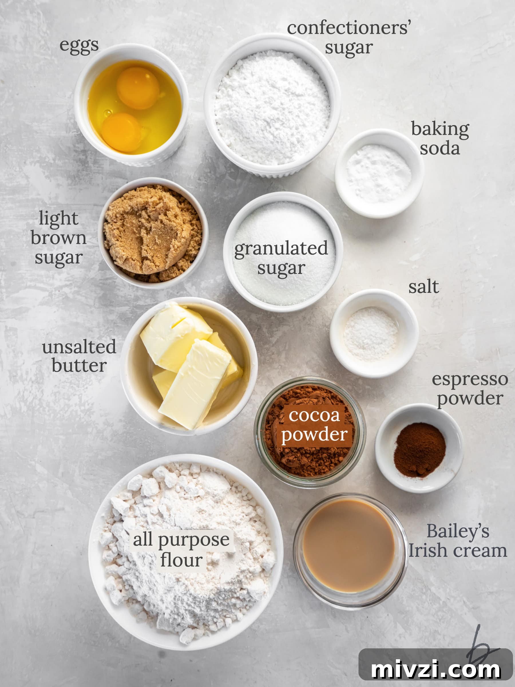 baileys irish cream cookies ingredients in bowls labeled with text.