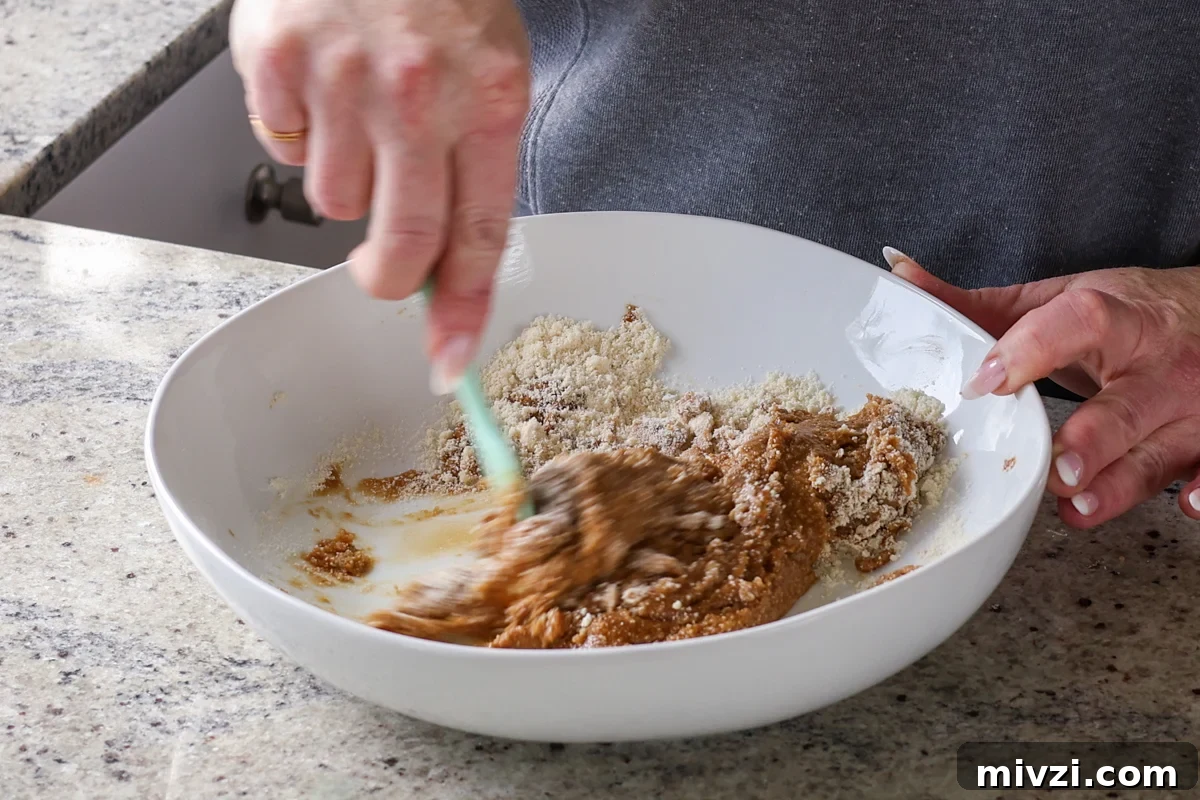 mixing the wet ingredients into the dry