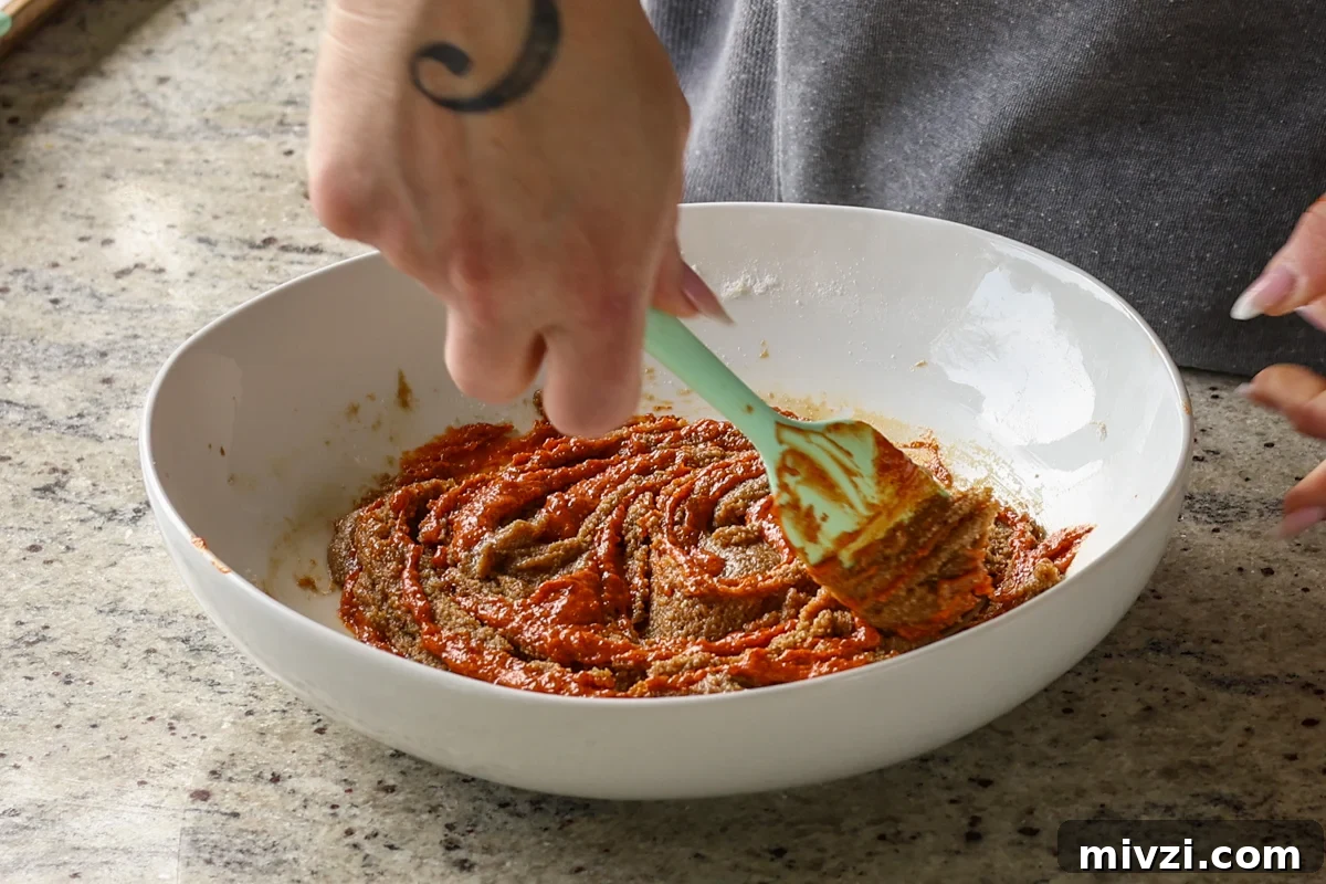 swirling the gochujang caramel into the dough