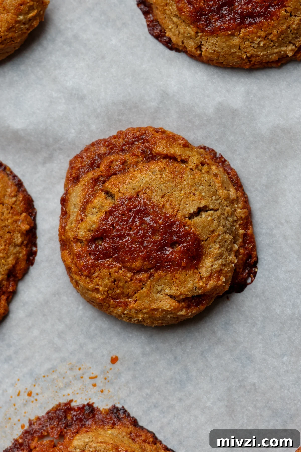 Gochujang Caramel Cookies — Gluten-Free with Nut-Free Options 91 close-up of gochujang caramel cookies on the baking sheet