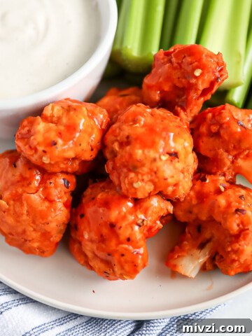 A plate of crispy vegan buffalo cauliflower wings
