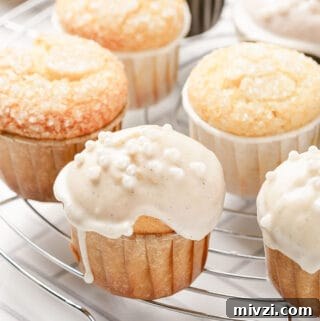 vanilla muffins on wire rack.