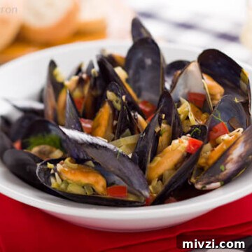 Mussels in White Wine (Moules Marinières) — Classic French Recipe 4 steamed mussels | AFoodcentriclife.com