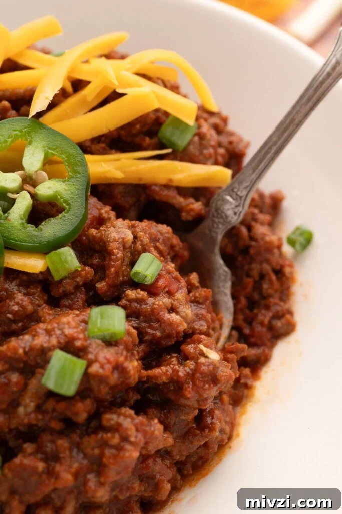 Authentic Texas Chili Recipe for Classic Frito Pie 6 closeup of thick Texas chili