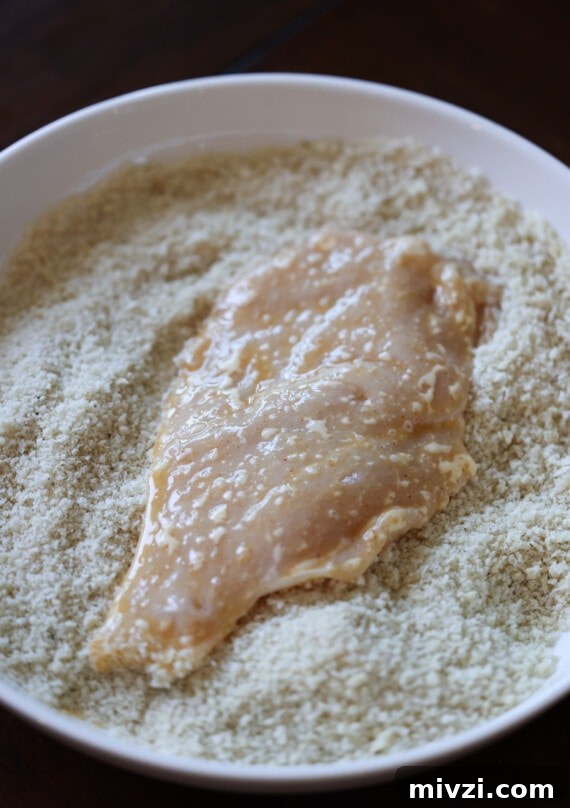 Crispy Pan-Fried Chicken Cutlets with Lemon Garlic Sauce 4 coating chicken cutlets in panko breadcrumbs