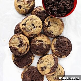 Marble Cookies Recipe: Soft Swirls of Chocolate and Vanilla 8 Chocolate and vanilla swirled cookies with melted chocolate chunks.