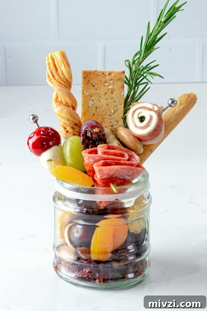 Cold and Room-Temperature Appetizers: 30 Make-Ahead Ideas 3 jarcuterie in a glass mason jar.