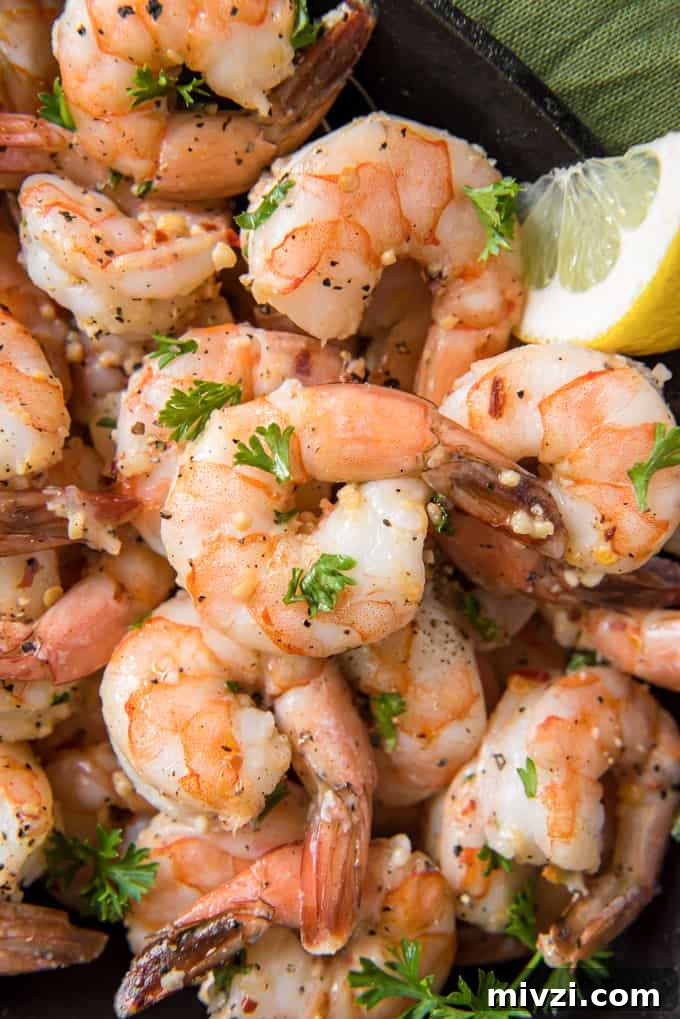 Cold and Room-Temperature Appetizers: 30 Make-Ahead Ideas 25 garlic shrimp with lemon wedge in bowl.