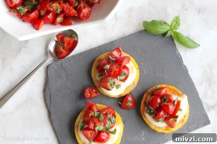 Cold and Room-Temperature Appetizers: 30 Make-Ahead Ideas 29 grilled polenta with mozzarella and tomatoes on a slate.