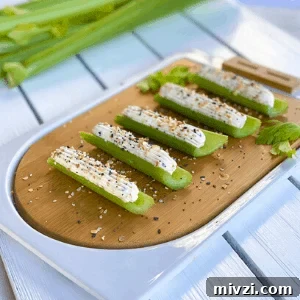 Cold and Room-Temperature Appetizers: 30 Make-Ahead Ideas 35 celery sticks snack with cream cheese filling topped with everything bagel blend.